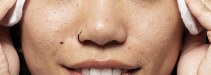 smiley-woman-with-nose-ring-front-view